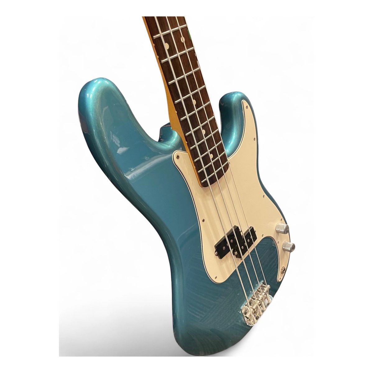 Low-angle view of the Lake Placid Blue P-bass body, split-coil pickup, controls and bridge